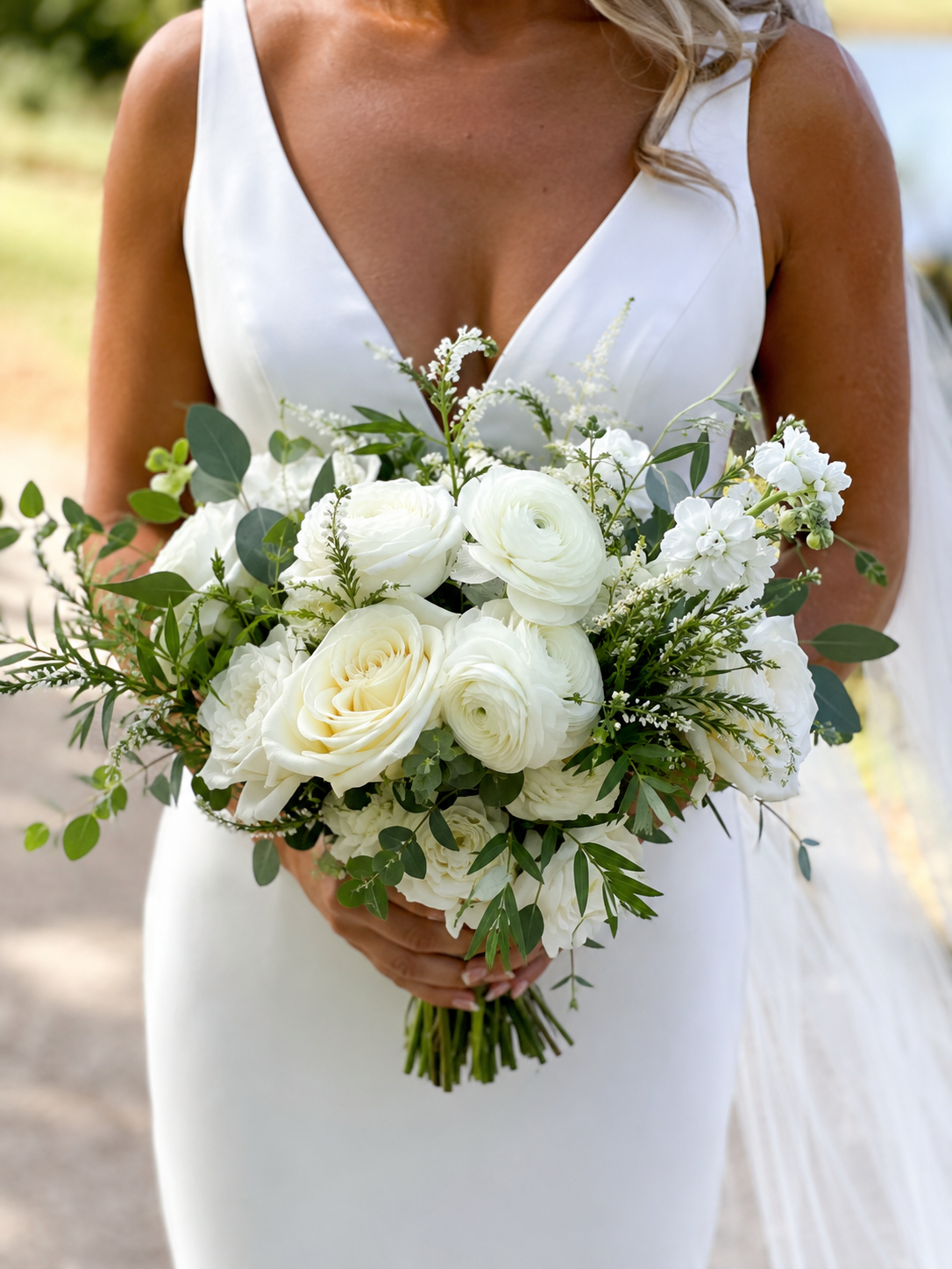 Bride holding white bouquet